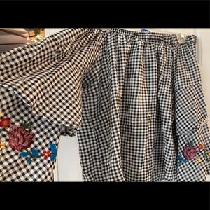 Off the shoulder buffalo checked shirt with floral embroidery on the sleeves